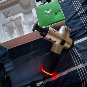 Hypervolt Massage Gun with Red and Black Accents